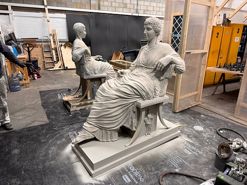 Seated Lady sculptures