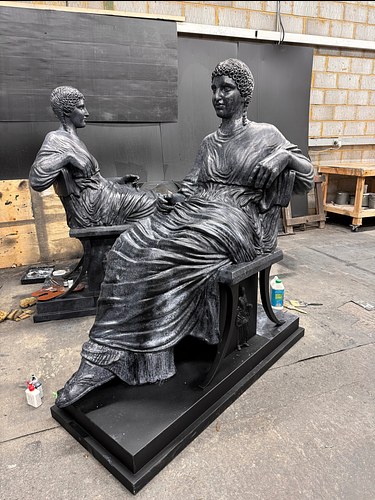 Seated Lady sculptures