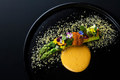 Asparagus with crab, uni, and cured yolk.