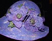 detail of blue floral felt hat