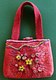 red felt bag with 'fruiting bodies'