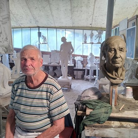Victor sat in the workshop and studio of Master Carver Luigo Carusi, Carrara Italy