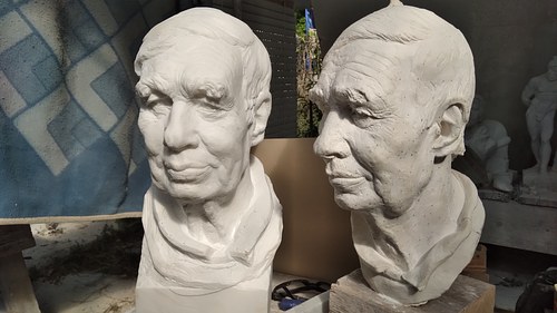 Marble  and modelled busts together