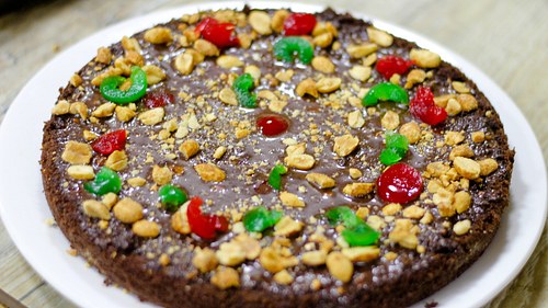 Chocolate Cake dressed with Peanuts and Berries