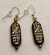 Black & gold hieroglyph earrings 