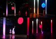 Stage design in various lighting (hanging drapes and ‘moon’) 