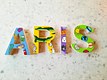 "Aris" painted wooden letters